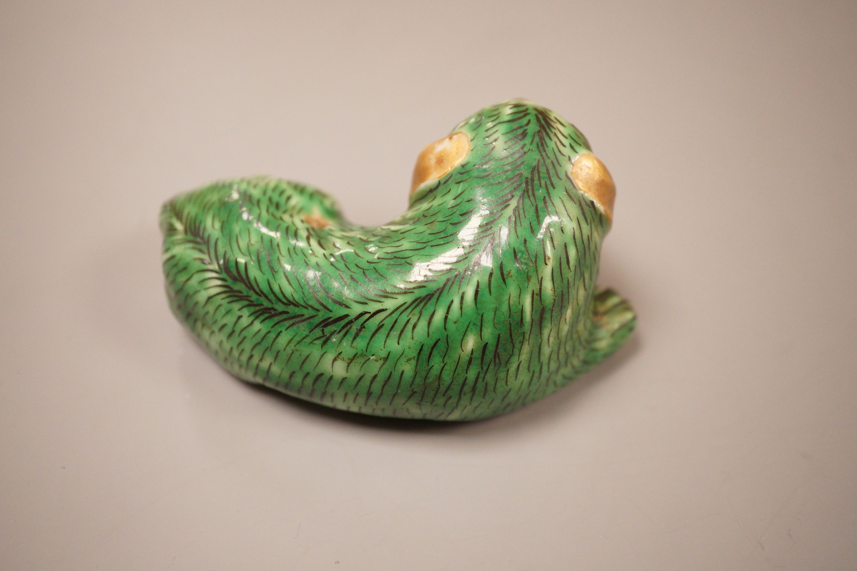 A small Chinese or Japanese green glazed dog waterdropper, 8.5cm wide
